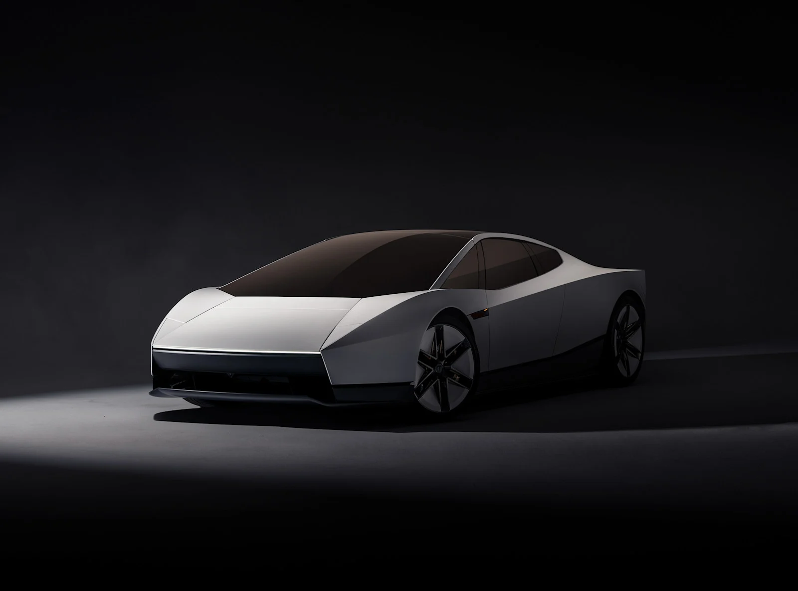 The new Tesla Roadster, a low angular two seat car with a dark glass canopy